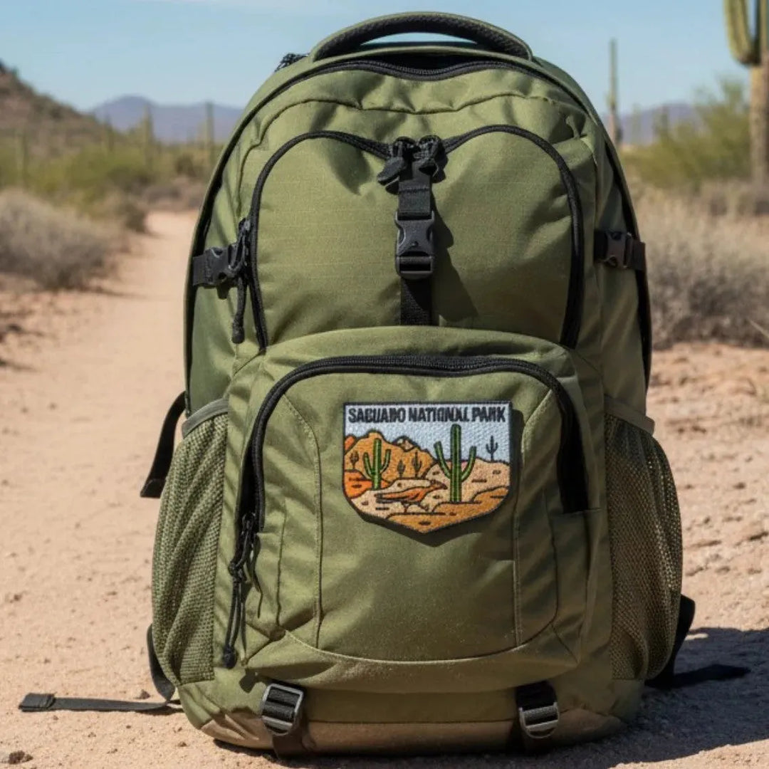 An olive green backpack with a &