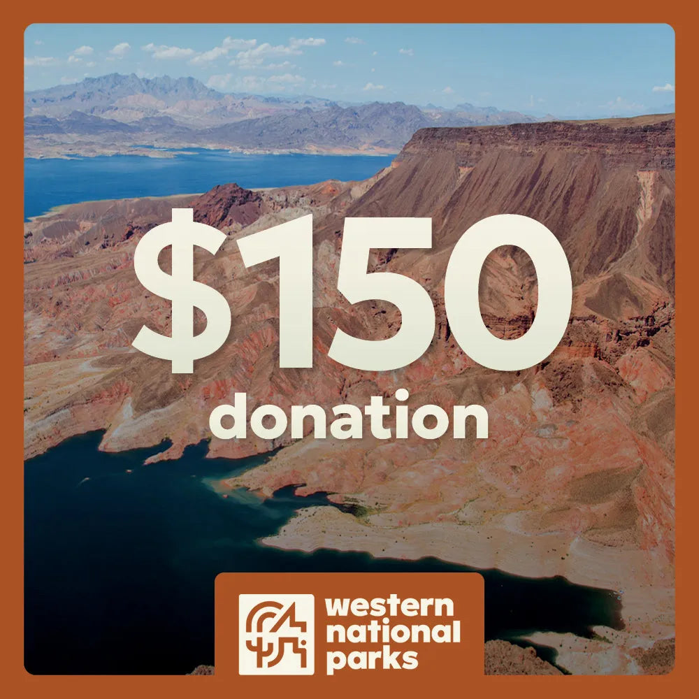 Scenic view of a desert landscape with mountains and water, featuring '$150 donation' text and Western National Parks logo.