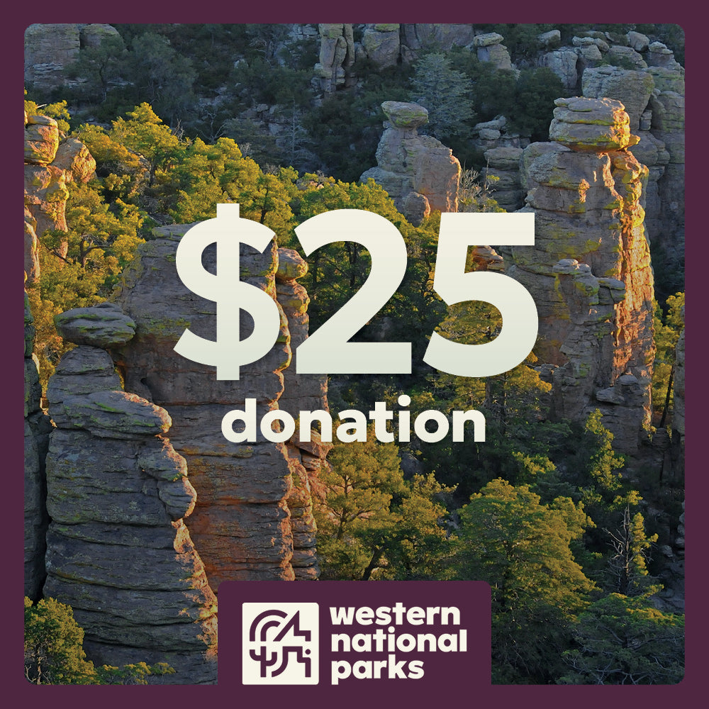 $25 donation for Western National Parks with a scenic background of rock formations and trees.