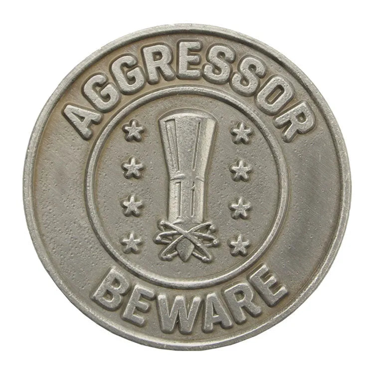 Minuteman Missile National Historic Site Collectible Token reverse view with "AGGRESSOR BEWARE" logo.